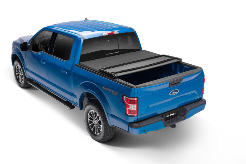 Lund 04-14 Ford F-150 (6.5ft. Bed) Genesis Elite Tri-Fold Tonneau Cover - Black