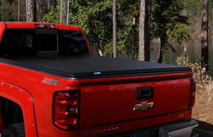 Lund 15-18 Ford F-150 Styleside (5.5ft. Bed) Hard Fold Tonneau Cover - Black