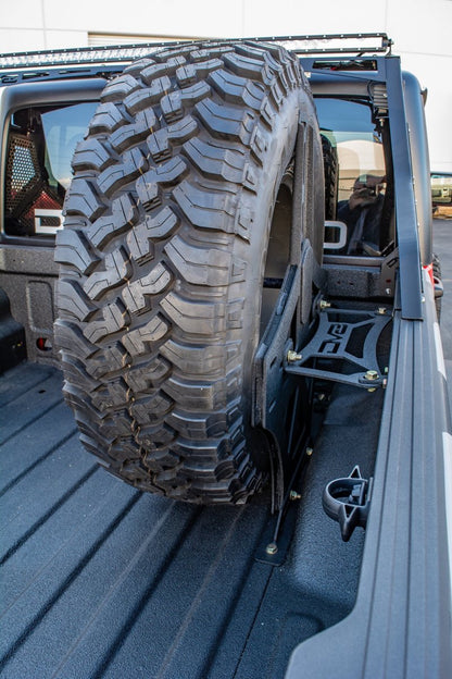 DV8 Offroad 2019+ Jeep Gladiator Universal Stand Up In-Bed Tire Carrier