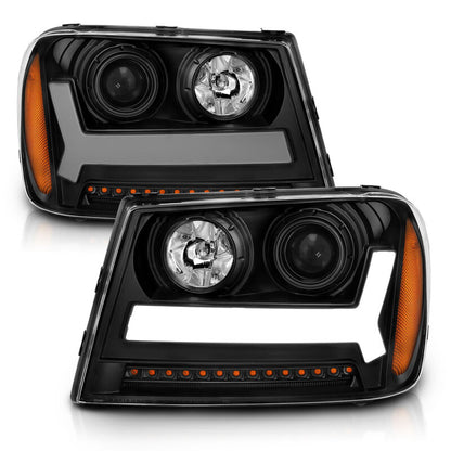 ANZO 2006-2009 Chevrolet Trailblazer Projector Headlights w/ Plank Style Design Black w/ Amber