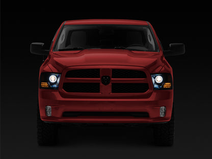 Raxiom 09-18 RAM 1500 Super White LED Halo Projector Headlights- Black Housing (Clear Lens)