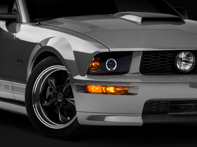 Raxiom 05-09 Ford Mustang Halogen 2010 Style LED Halo Headlights-Blk Hsng(Clear Lens/Excludes GT500)