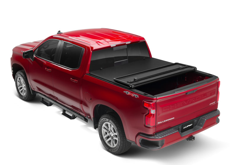 Lund 15-17 Chevy Silverado 3500 Fleetside (6.6ft. Bed) Hard Fold Tonneau Cover - Black