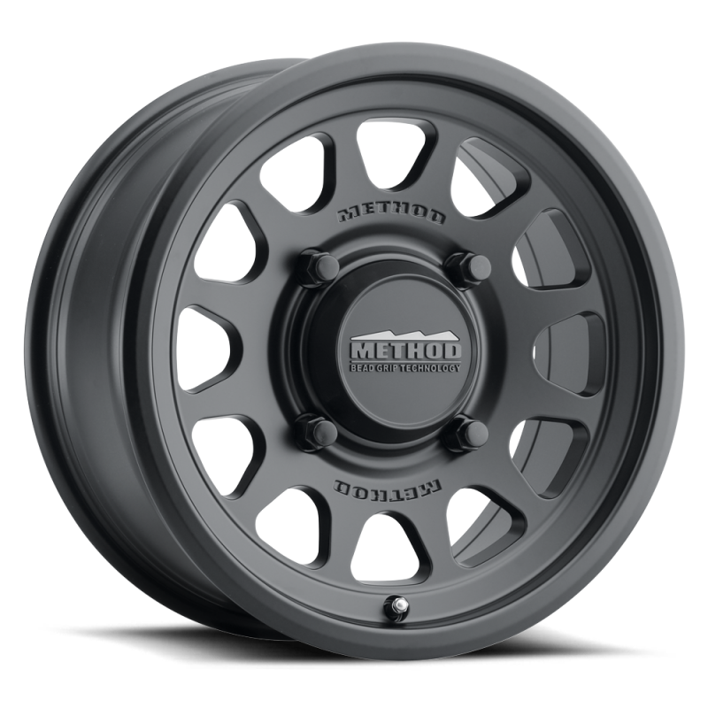 Method MR414 Bead Grip 15x7 / 5+2/38mm Offset / 4x136 / 106mm CB Matte Black Wheel